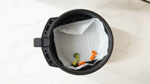 can you put parchment paper in an air fryer without it burning
