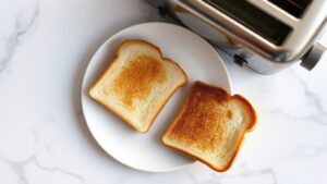 why does my toaster burn one side of the bread