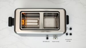 how does a toaster know when to pop up